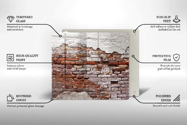 Skärbräda av glas Gammal tegel- och betongvägg