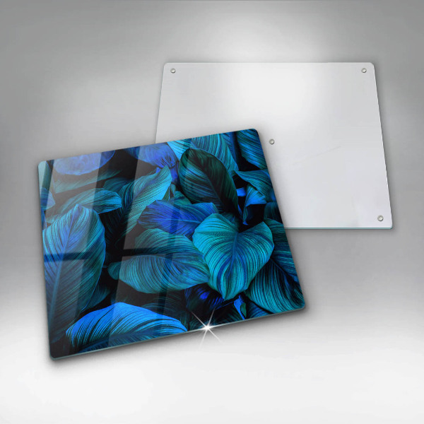 Skärbräda av glas Lämnar djungelvegetation