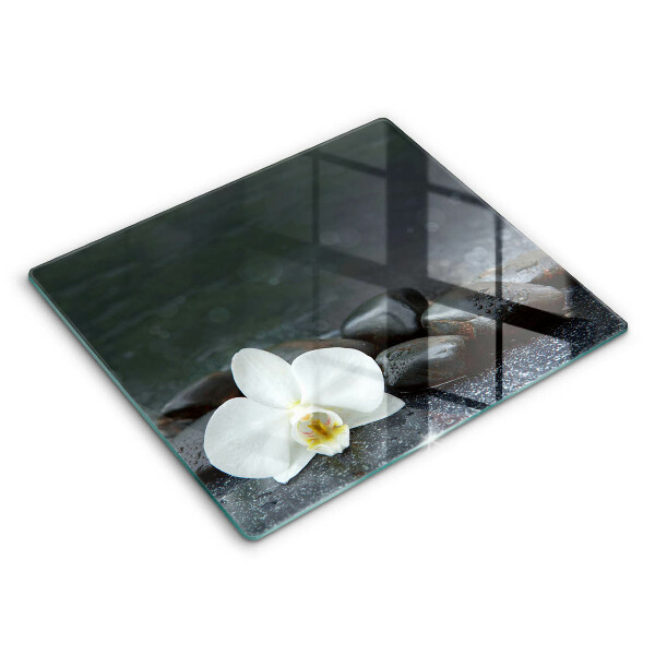 Skärbräda av glas Vita blomma zen stenar