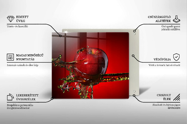 Skärbräda av glas Äppelfrukt i vatten