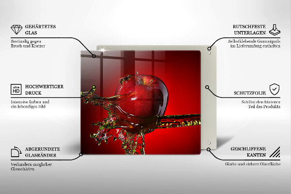 Skärbräda av glas Äppelfrukt i vatten