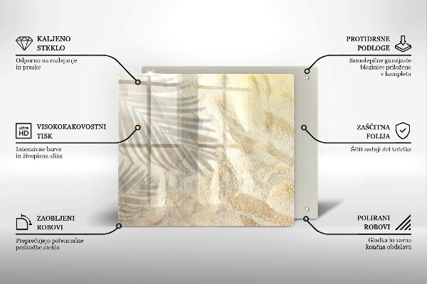 Skärbräda av glas Palmblad och sand