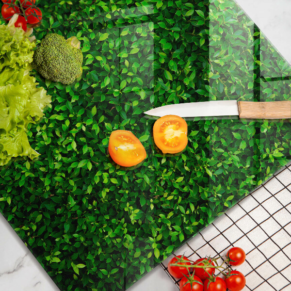 Skärbräda av glas Plantera små blad