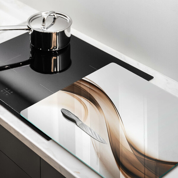 Skärbräda av glas Abstrakta bruna linjer