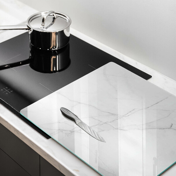 Skärbräda av glas Bakgrund marmor sten