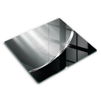 Skärbräda av glas Abstraktion med metall