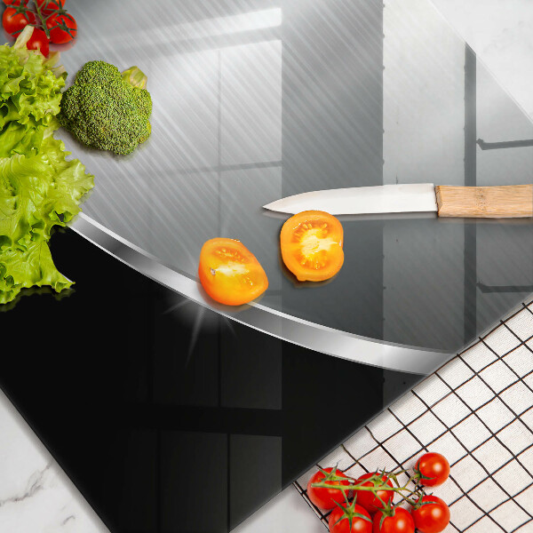 Skärbräda av glas Abstraktion med metall