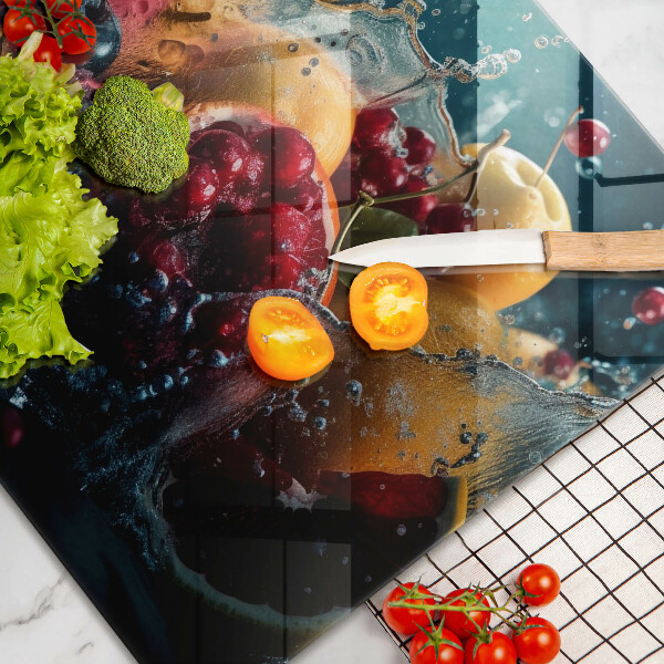 Skärbräda glas modern Frukt i vatten