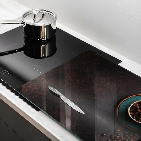 Skärbräda glas modern En kopp kaffebönor