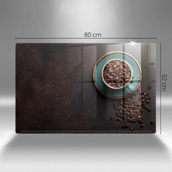 Skärbräda glas modern En kopp kaffebönor