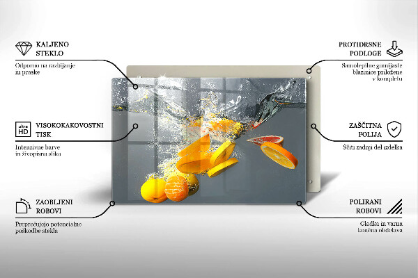 Skärbräda glas modern Citroner i vatten