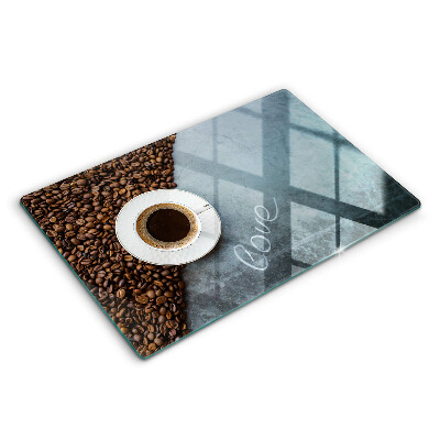 Skärbräda glas modern Kaffebönor och en kopp
