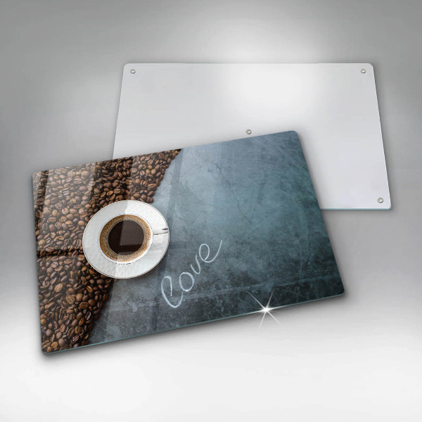 Skärbräda glas modern Kaffebönor och en kopp