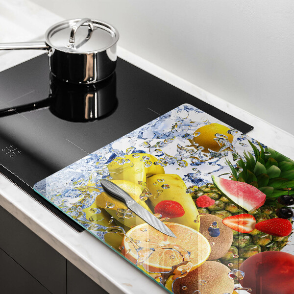 Skärbräda glas modern Saftig frukt och vatten