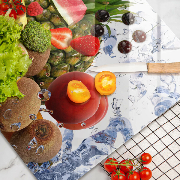 Skärbräda glas modern Saftig frukt och vatten