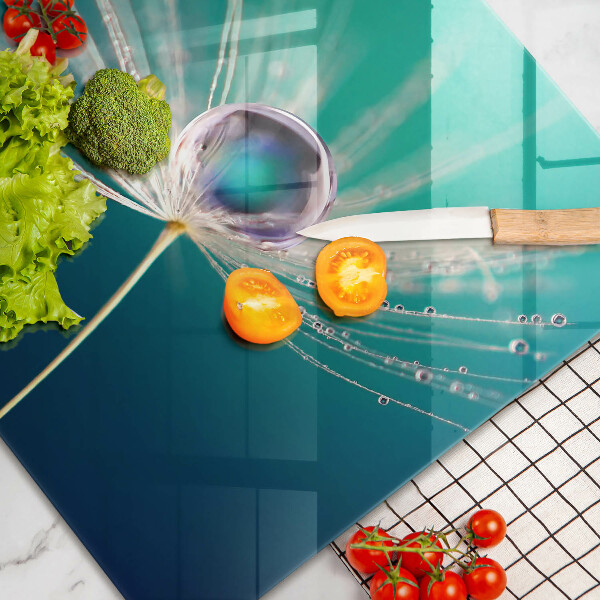 Skärbräda glas modern Dagg på maskrosen