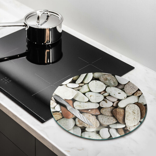 Skärbräda glas unik Små stenar bakgrund