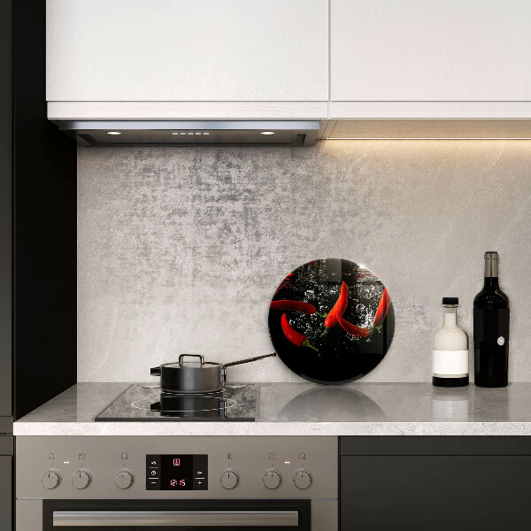 Skärbräda glas unik Chilipeppar i vatten