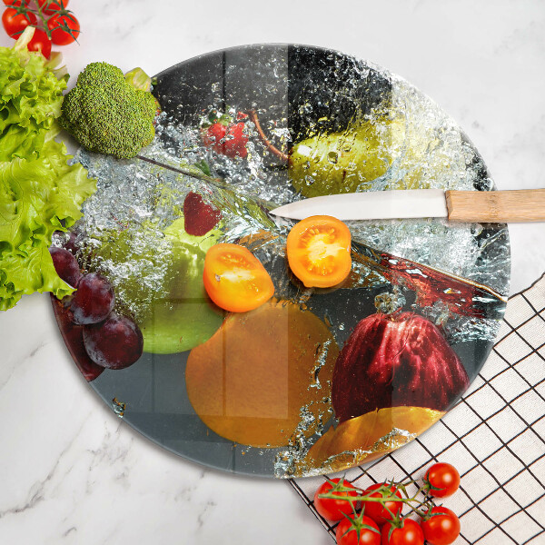 Skärbräda glas unik Saftig frukt i vatten