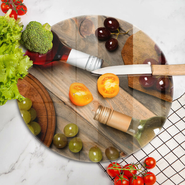 Skärbräda glas unik Vinflaskor och druvor