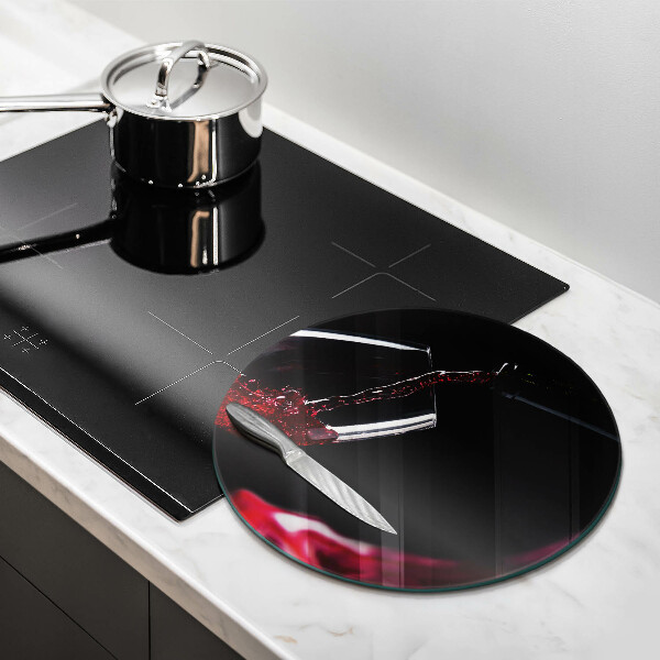 Skärbräda glas unik Ett glas rött vin