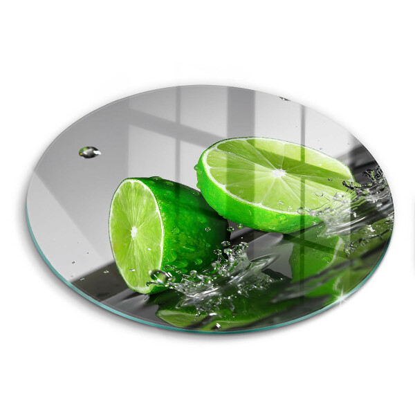 Skärbräda glas unik Saftiga lime och vatten
