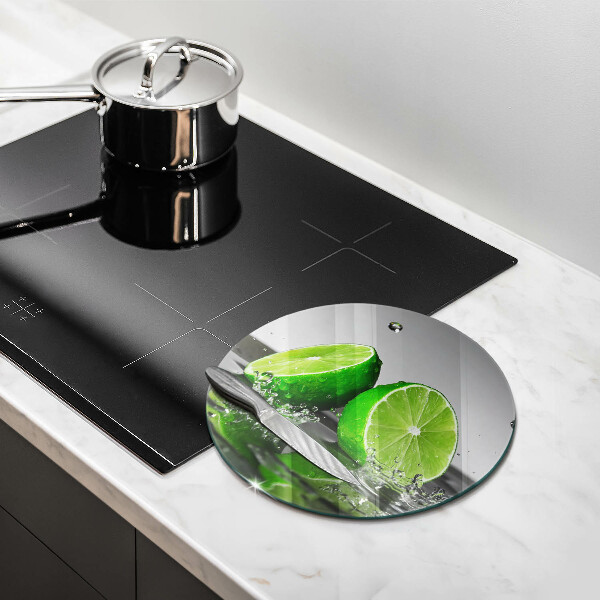 Skärbräda glas unik Saftiga lime och vatten