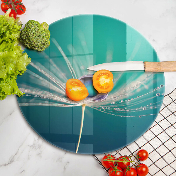 Skärbräda glas unik Dagg på en maskros