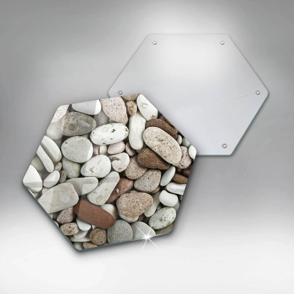 Skärbräda glas sexhörning Små stenar bakgrund