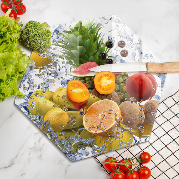 Skärbräda glas sexhörning Saftig frukt och vatten