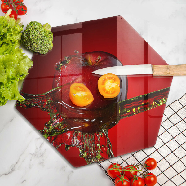 Skärbräda glas sexhörning Äppelfrukt i vatten