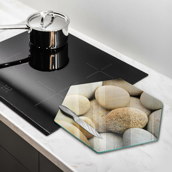 Skärbräda glas sexhörning Mönster av ovala stenar