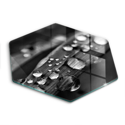 Skärbräda glas sexhörning Daggdroppar på löven