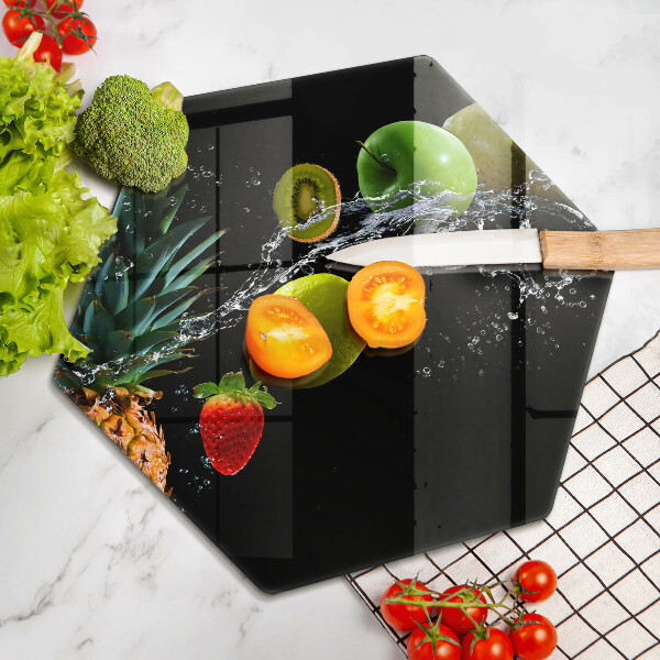 Skärbräda glas sexhörning Frukt i vatten