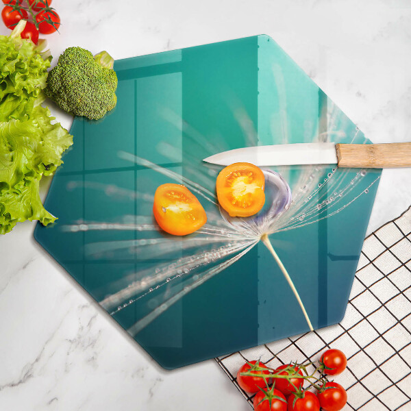 Skärbräda glas sexhörning Dagg på en maskros