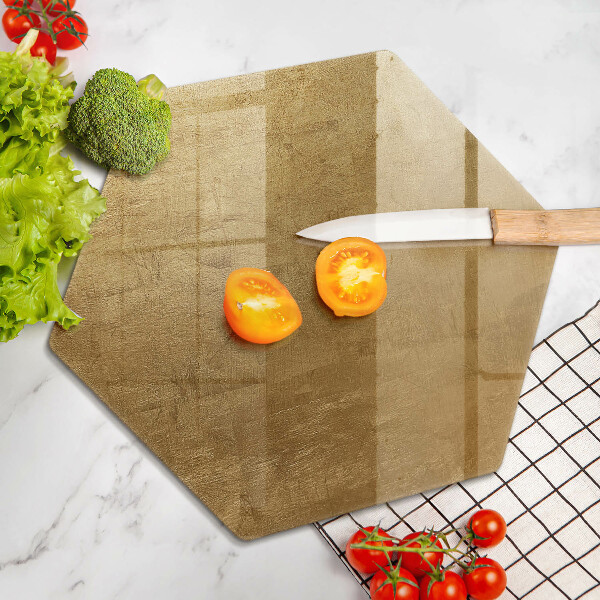 Skärbräda glas sexhörning Guld textur bakgrund