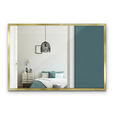 Stilren rektangulär spegel med guldram 60x40 cm