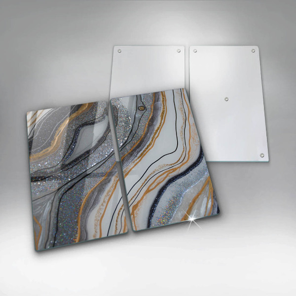 Skydd för induktionsspis sten med guld