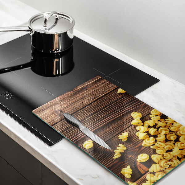 Skydd för induktionsspis modern Pasta på bordet
