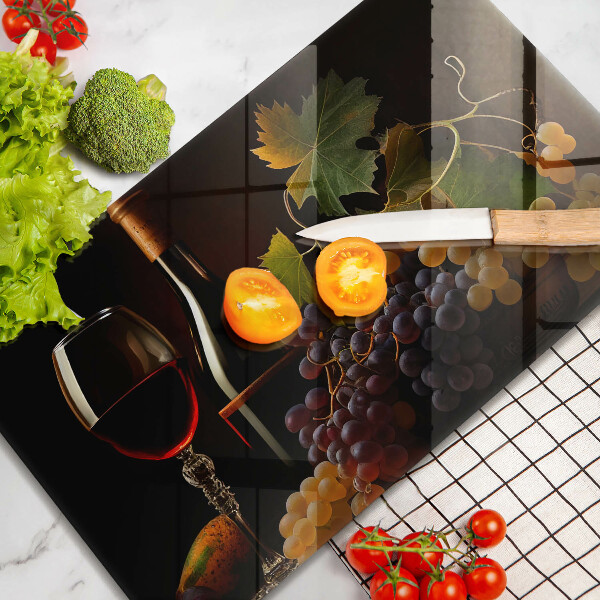 Kokkärlskydd original Ett glas vin och druvor