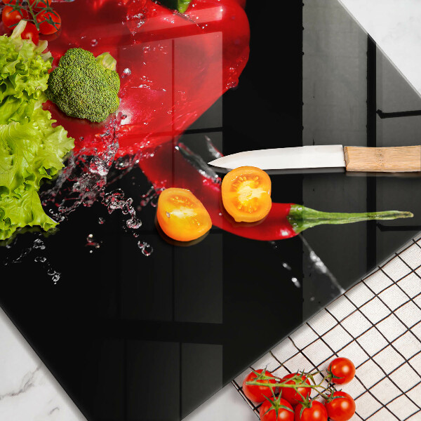 Spisskyddsplatta unik Röd paprika i vatten