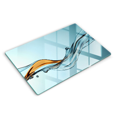 Spisskyddsplatta elegant Vatten på en blå bakgrund