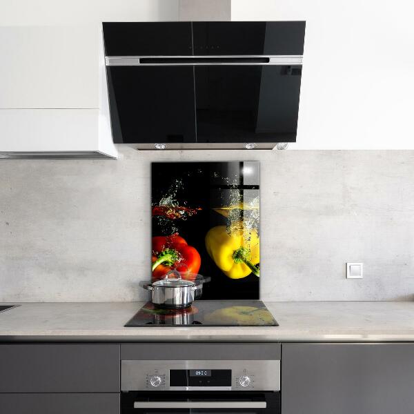 Stänkskydd kök Färgglada paprika under vatten