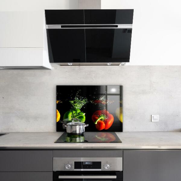 Stänkskydd kök Färgglada paprika under vatten