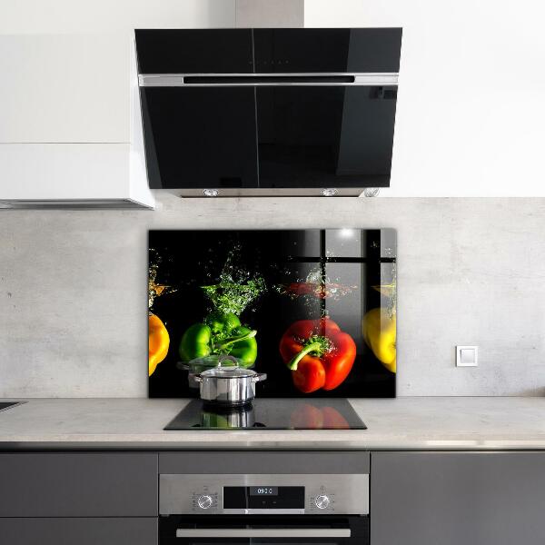 Stänkskydd kök Färgglada paprika under vatten