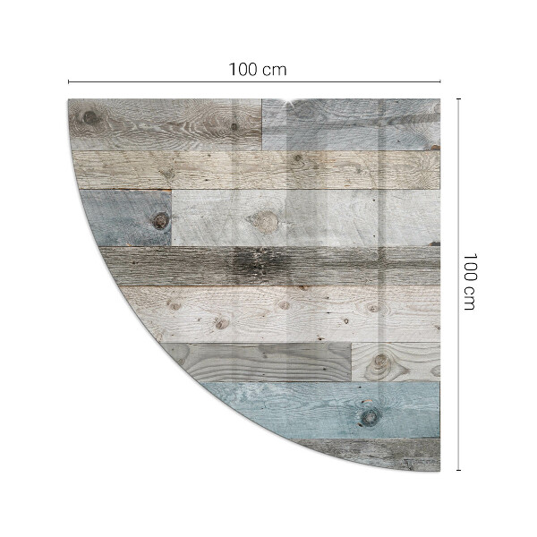 Fjärdedelscirkel glasskiva framför öppen spis Plankor i olika nyanser