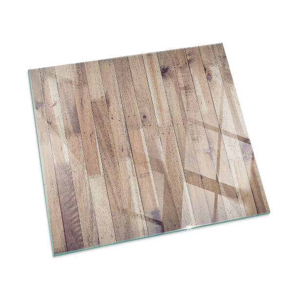 Kvadratisk glasskiva framför öppen spis Träplank i mönster