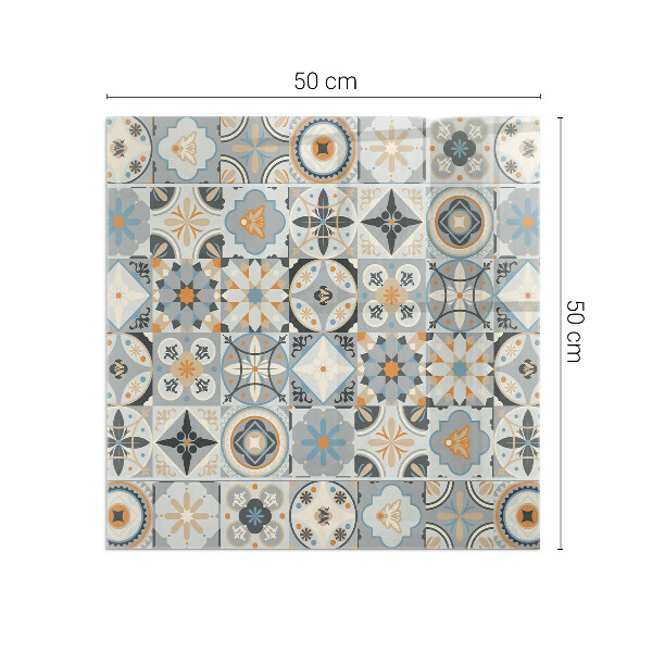Kvadratisk glasskiva under braskamin Mosaikmönster på kakel