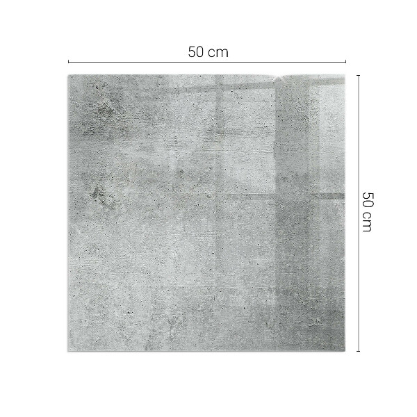 Kvadratisk glasskiva under kamin Rå betongstruktur