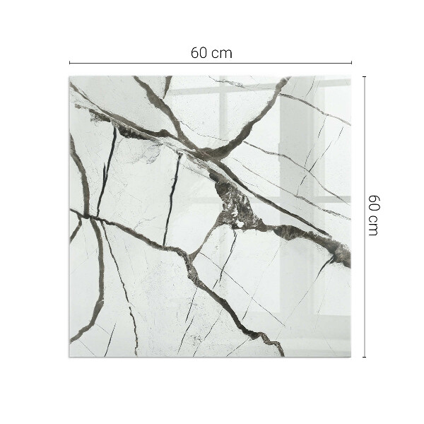 Kvadratisk glasskiva framför öppen spis Marmorådringar